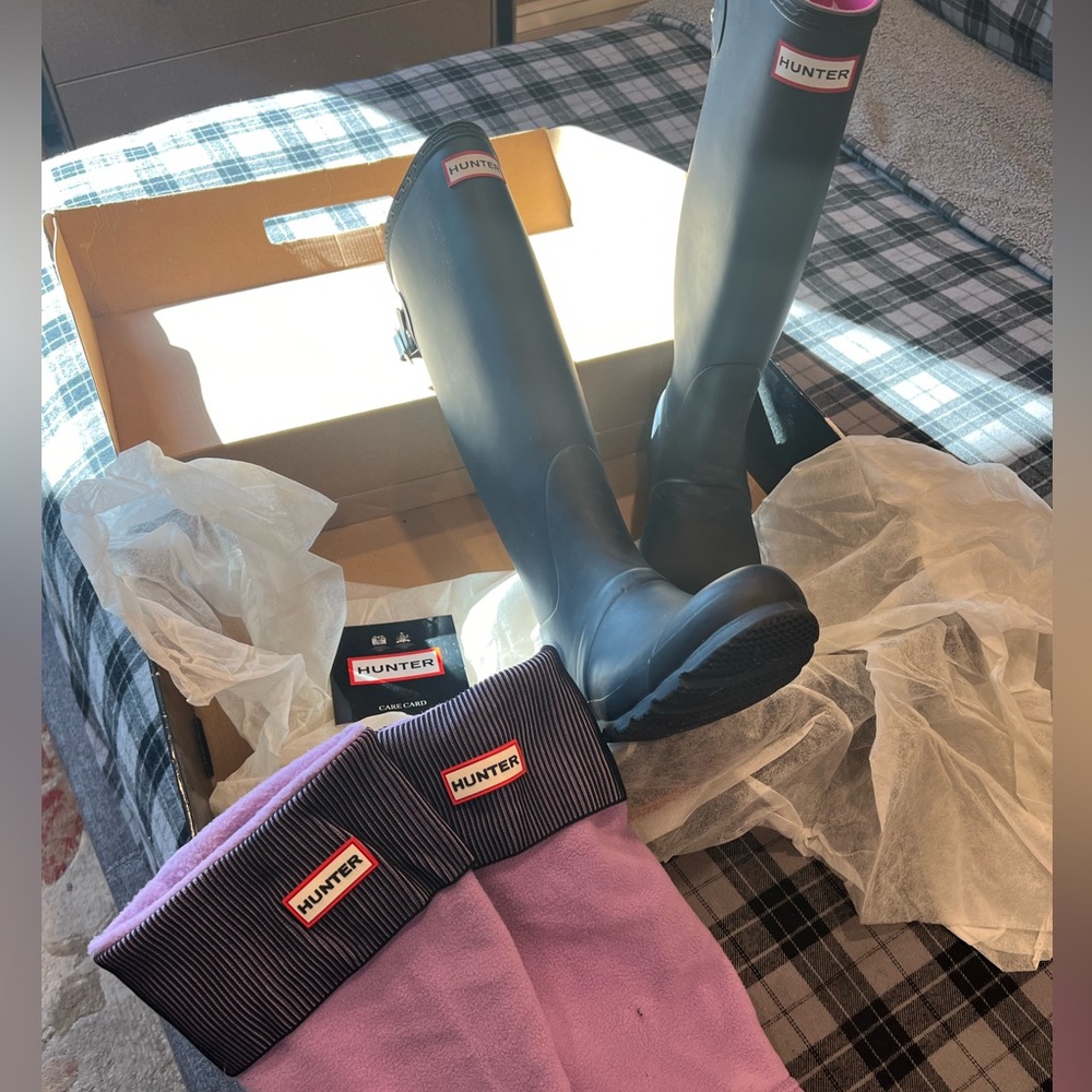 Tall Hunter Rain boots. Blue and pink inside.